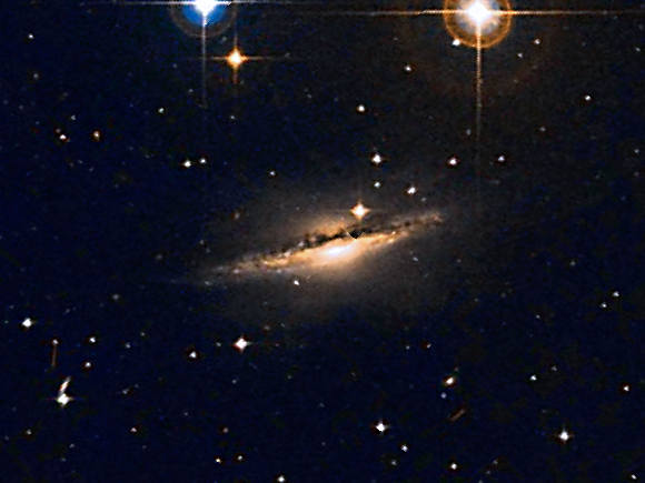 NGC 1055, galaxie spirale, dans la constellation de la Baleine.