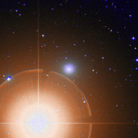 Mirach et NGC 404.